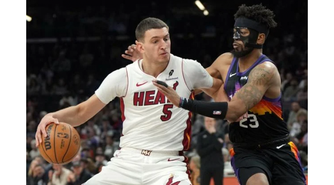 La chaleur bat le court-main Suns 111-102 en court tour derrière les 22 points d'Adebayo